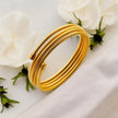 Trendy gold plated multi-layered flexible bangle – a bold and stylish statement piece designed for modern women, perfect to elevate both daily wear and party looks.
